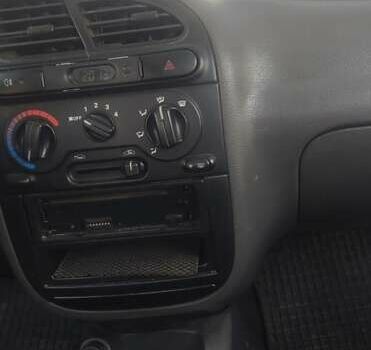 Сірий Деу Ланос, об'ємом двигуна 1.5 л та пробігом 179 тис. км за 2300 $, фото 5 на Automoto.ua