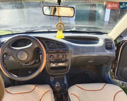 Серый Дэу Ланос, объемом двигателя 1.39 л и пробегом 330 тыс. км за 1200 $, фото 2 на Automoto.ua