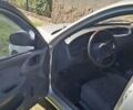 Сірий Деу Ланос, об'ємом двигуна 1.39 л та пробігом 170 тис. км за 1599 $, фото 4 на Automoto.ua