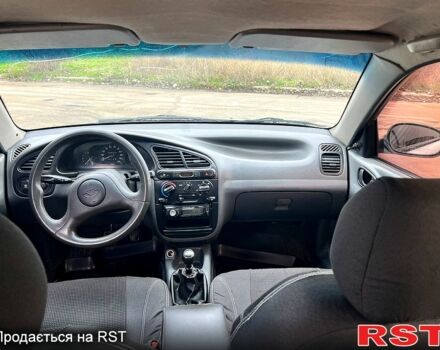 Серый Дэу Ланос, объемом двигателя 1.5 л и пробегом 221 тыс. км за 2450 $, фото 4 на Automoto.ua