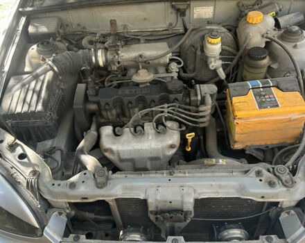 Сірий Деу Ланос, об'ємом двигуна 1.5 л та пробігом 290 тис. км за 2000 $, фото 6 на Automoto.ua