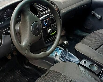 Серый Дэу Ланос, объемом двигателя 1.4 л и пробегом 340 тыс. км за 1950 $, фото 5 на Automoto.ua