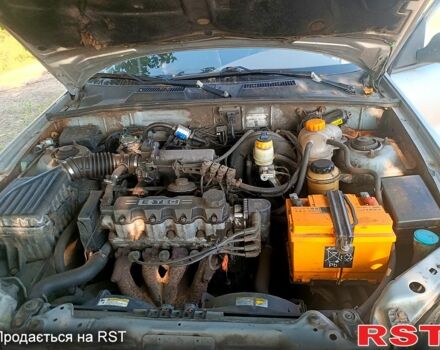 Серый Дэу Ланос, объемом двигателя 1.5 л и пробегом 200 тыс. км за 1150 $, фото 1 на Automoto.ua