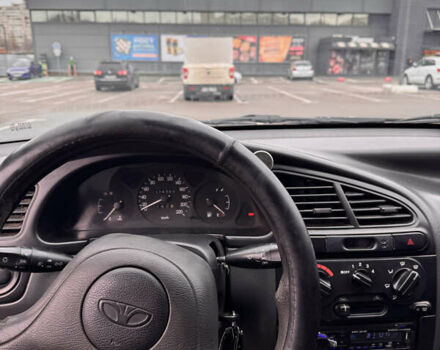 Сірий Деу Ланос, об'ємом двигуна 1.39 л та пробігом 314 тис. км за 1500 $, фото 13 на Automoto.ua