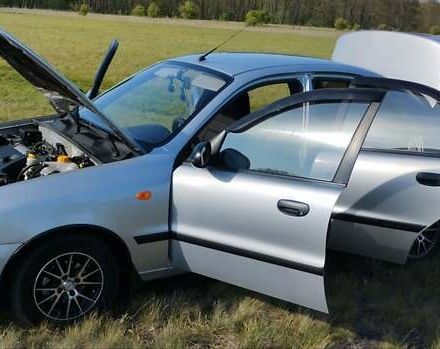 Серый Дэу Ланос, объемом двигателя 1.4 л и пробегом 225 тыс. км за 2700 $, фото 4 на Automoto.ua