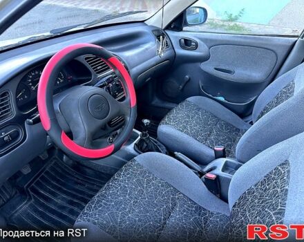 Серый Дэу Ланос, объемом двигателя 1.4 л и пробегом 198 тыс. км за 1299 $, фото 8 на Automoto.ua