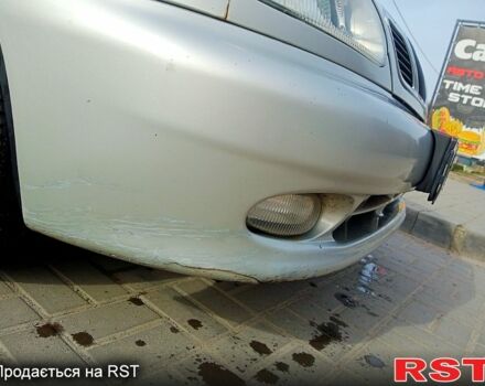 Сірий Деу Ланос, об'ємом двигуна 1.4 л та пробігом 245 тис. км за 1600 $, фото 1 на Automoto.ua