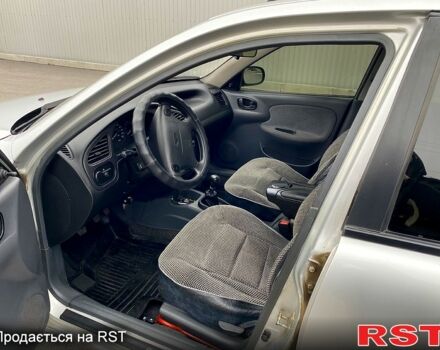 Сірий Деу Ланос, об'ємом двигуна 1.6 л та пробігом 150 тис. км за 3160 $, фото 11 на Automoto.ua