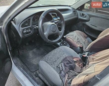 Серый Дэу Ланос, объемом двигателя 1.5 л и пробегом 290 тыс. км за 900 $, фото 3 на Automoto.ua