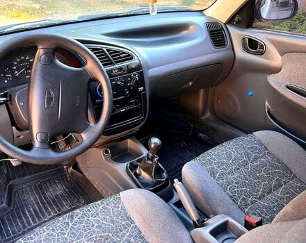 Деу Ланос 2007 у Вінниці на Automoto.ua Сірий Деу Ланос, об'ємом двигуна 1.4 л та пробігом 100 тис. км за 1700 $, фото 6 на Automoto.ua