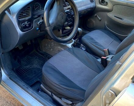 Серый Дэу Ланос, объемом двигателя 1.3 л и пробегом 190 тыс. км за 1650 $, фото 6 на Automoto.ua