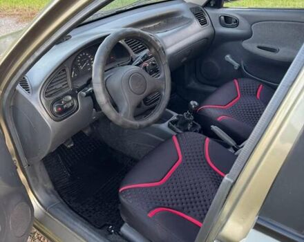 Серый Дэу Ланос, объемом двигателя 1.39 л и пробегом 151 тыс. км за 1500 $, фото 5 на Automoto.ua