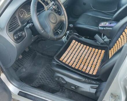 Сірий Деу Ланос, об'ємом двигуна 1.5 л та пробігом 320 тис. км за 1500 $, фото 17 на Automoto.ua