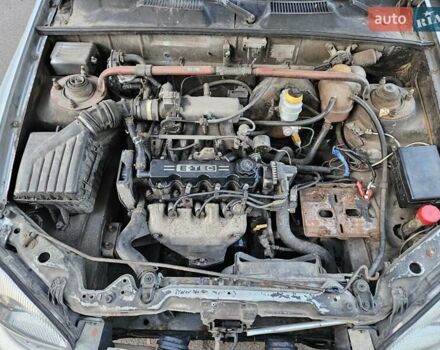 Серый Дэу Ланос, объемом двигателя 1.5 л и пробегом 290 тыс. км за 900 $, фото 4 на Automoto.ua