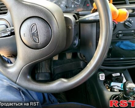 Серый Дэу Ланос, объемом двигателя 1.5 л и пробегом 230 тыс. км за 2400 $, фото 4 на Automoto.ua