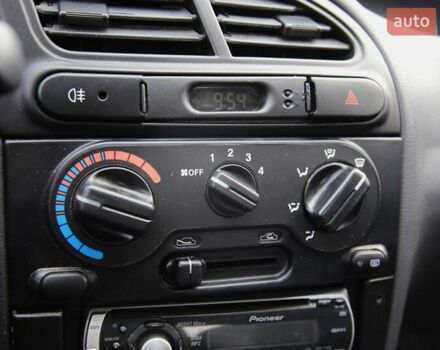 Сірий Деу Ланос, об'ємом двигуна 1.5 л та пробігом 109 тис. км за 1600 $, фото 15 на Automoto.ua