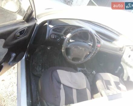 Сірий Деу Ланос, об'ємом двигуна 1.5 л та пробігом 225 тис. км за 1150 $, фото 4 на Automoto.ua