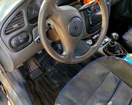 Серый Дэу Ланос, объемом двигателя 1.5 л и пробегом 230 тыс. км за 2400 $, фото 5 на Automoto.ua