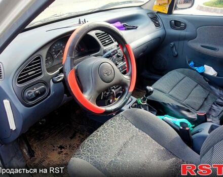 Сірий Деу Ланос, об'ємом двигуна 1.4 л та пробігом 245 тис. км за 1600 $, фото 2 на Automoto.ua