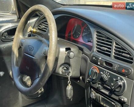 Серый Дэу Ланос, объемом двигателя 1.5 л и пробегом 290 тыс. км за 2500 $, фото 40 на Automoto.ua