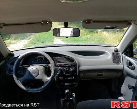 Серый Дэу Ланос, объемом двигателя 1.5 л и пробегом 287 тыс. км за 2000 $, фото 5 на Automoto.ua