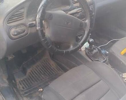 Сірий Деу Ланос, об'ємом двигуна 1.6 л та пробігом 290 тис. км за 1000 $, фото 3 на Automoto.ua