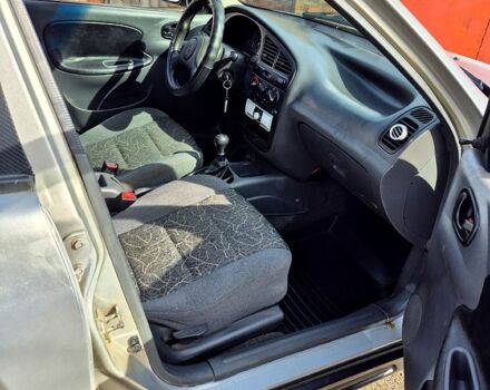 Серый Дэу Ланос, объемом двигателя 1.5 л и пробегом 220 тыс. км за 1500 $, фото 2 на Automoto.ua