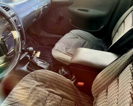 Сірий Деу Ланос, об'ємом двигуна 1.5 л та пробігом 220 тис. км за 1750 $, фото 3 на Automoto.ua