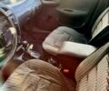 Сірий Деу Ланос, об'ємом двигуна 1.5 л та пробігом 220 тис. км за 1750 $, фото 3 на Automoto.ua