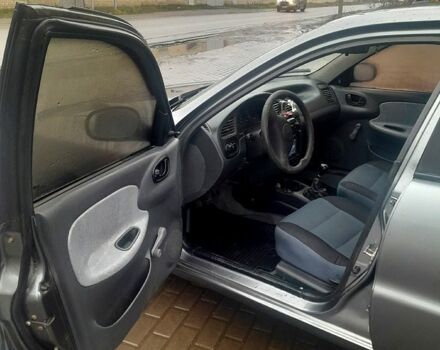 Серый Дэу Ланос, объемом двигателя 1.5 л и пробегом 237 тыс. км за 1950 $, фото 5 на Automoto.ua