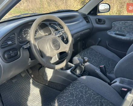 Сірий Деу Ланос, об'ємом двигуна 1.5 л та пробігом 240 тис. км за 1550 $, фото 11 на Automoto.ua