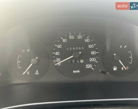 Сірий Деу Ланос, об'ємом двигуна 1.39 л та пробігом 220 тис. км за 2200 $, фото 3 на Automoto.ua