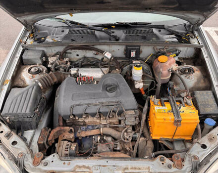 Сірий Деу Ланос, об'ємом двигуна 1.39 л та пробігом 314 тис. км за 1500 $, фото 14 на Automoto.ua