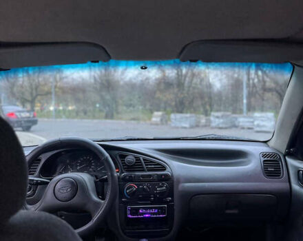 Сірий Деу Ланос, об'ємом двигуна 1.5 л та пробігом 230 тис. км за 1150 $, фото 7 на Automoto.ua