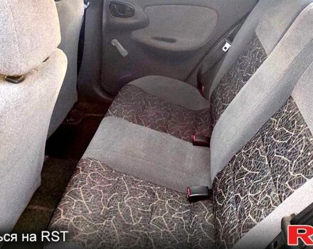 Сірий Деу Ланос, об'ємом двигуна 1.5 л та пробігом 102 тис. км за 2499 $, фото 2 на Automoto.ua