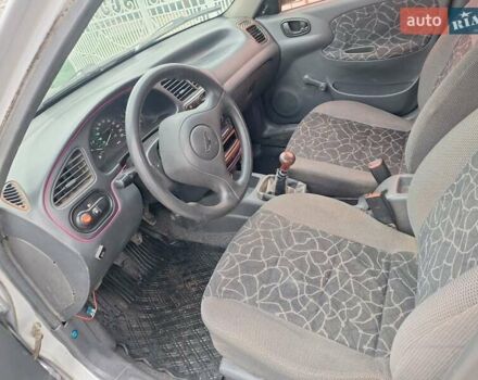 Сірий Деу Ланос, об'ємом двигуна 1.3 л та пробігом 111 тис. км за 1100 $, фото 26 на Automoto.ua