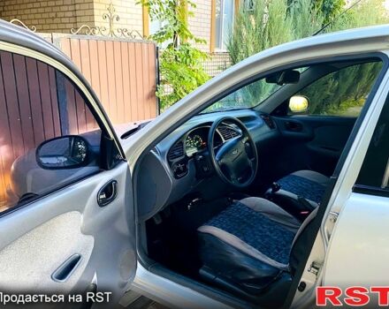 Сірий Деу Ланос, об'ємом двигуна 1.6 л та пробігом 150 тис. км за 2700 $, фото 7 на Automoto.ua