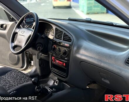 Сірий Деу Ланос, об'ємом двигуна 1.6 л та пробігом 225 тис. км за 3300 $, фото 6 на Automoto.ua