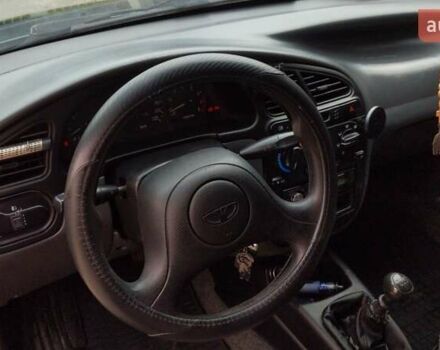 Серый Дэу Ланос, объемом двигателя 1.5 л и пробегом 210 тыс. км за 2000 $, фото 13 на Automoto.ua