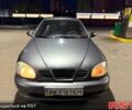 Сірий Деу Ланос, об'ємом двигуна 1.4 л та пробігом 128 тис. км за 1000 $, фото 1 на Automoto.ua
