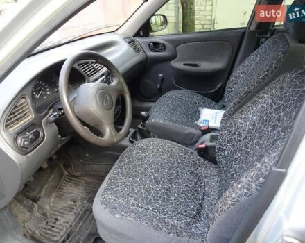 Серый Дэу Ланос, объемом двигателя 1.5 л и пробегом 84 тыс. км за 4200 $, фото 9 на Automoto.ua