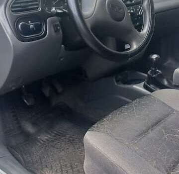 Деу Ланос 2008 у Буче на Automoto.ua Сірий Деу Ланос, об'ємом двигуна 1.39 л та пробігом 265 тис. км за 2050 $, фото 3 на Automoto.ua