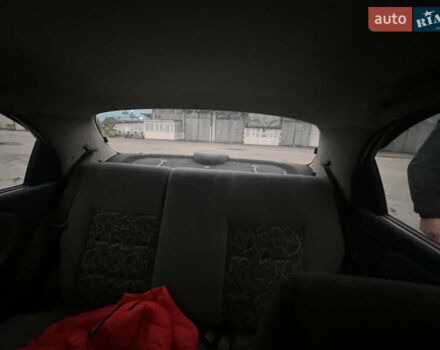 Деу Ланос 2008 у Сарнах на Automoto.ua Сірий Деу Ланос, об'ємом двигуна 1.5 л та пробігом 80 тис. км за 3050 $, фото 5 на Automoto.ua