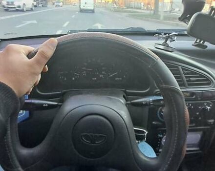 Сірий Деу Ланос, об'ємом двигуна 1.39 л та пробігом 220 тис. км за 3000 $, фото 3 на Automoto.ua