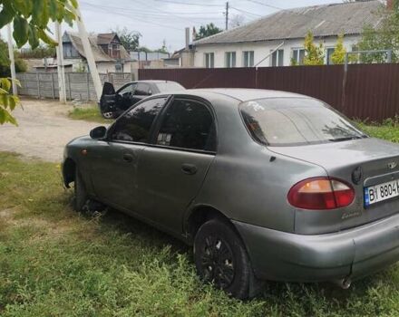 Сірий Деу Ланос, об'ємом двигуна 1.5 л та пробігом 250 тис. км за 1488 $, фото 3 на Automoto.ua