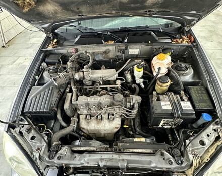 Сірий Деу Ланос, об'ємом двигуна 1.5 л та пробігом 150 тис. км за 1550 $, фото 7 на Automoto.ua