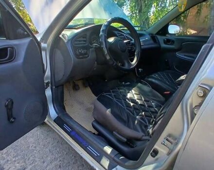 Сірий Деу Ланос, об'ємом двигуна 1.39 л та пробігом 198 тис. км за 2200 $, фото 4 на Automoto.ua