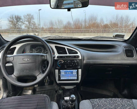 Сірий Деу Ланос, об'ємом двигуна 1.6 л та пробігом 305 тис. км за 1999 $, фото 1 на Automoto.ua