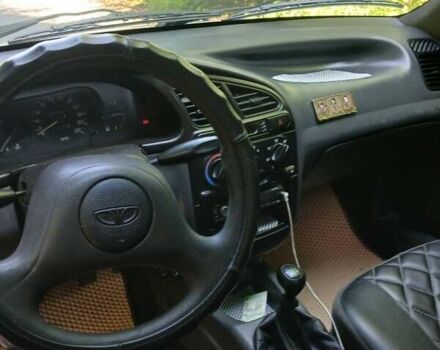 Сірий Деу Ланос, об'ємом двигуна 1.39 л та пробігом 198 тис. км за 2200 $, фото 2 на Automoto.ua