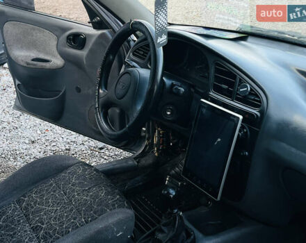 Серый Дэу Ланос, объемом двигателя 1.5 л и пробегом 221 тыс. км за 1850 $, фото 18 на Automoto.ua